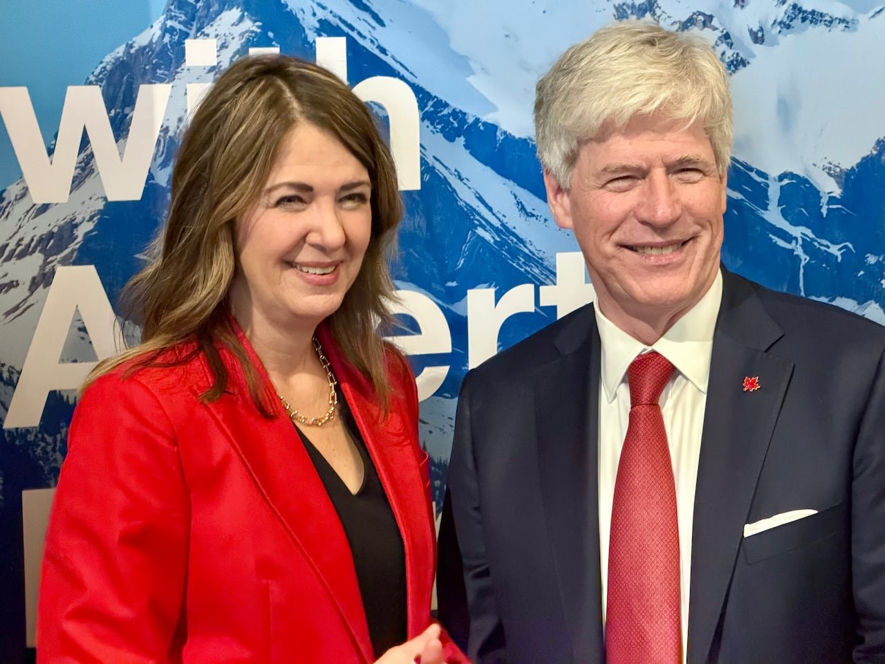 default-406 Two politicians smile as their photo is taken.