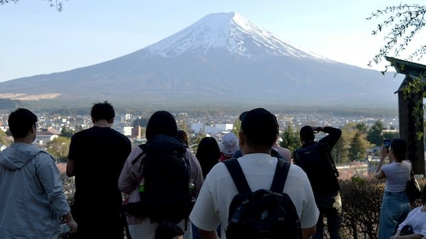 “Fujiyoshida Battles Overtourism Crisis at Mt. Fuji”