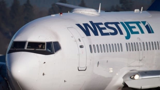 WestJet raises checked baggage fees by up to $10
