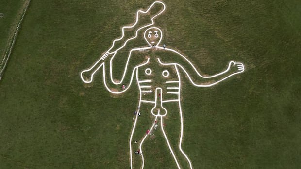 “Volunteers Restore Iconic Cerne Abbas Giant”